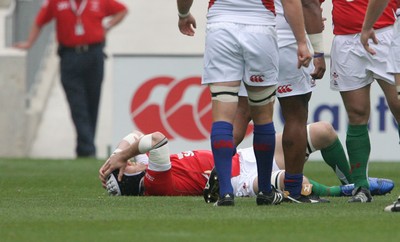 06.06.09 USA v Wales... Wales' Ryan Jones lies injured on the field. 