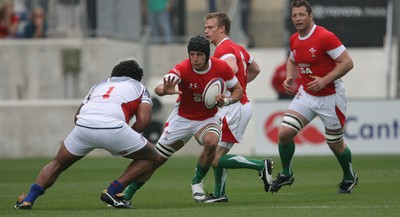 06.06.09 USA v Wales... Wales' Robin Sowden Taylor takes on USA's Matekitonga Moeakiola. 