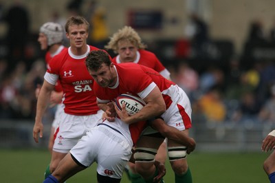 06.06.09 USA v Wales... Wales'  Deiniol Jones powers through. 