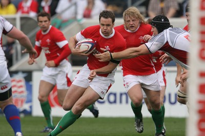 06.06.09 USA v Wales... Wales'  Mark Jones finds a gap. 