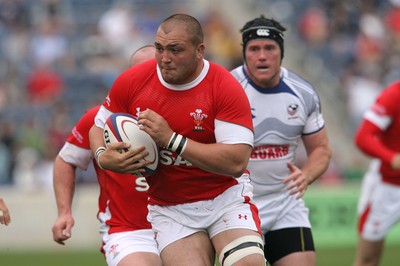 06.06.09 USA v Wales... Wales'  Craig Mitchell finds a gap. 