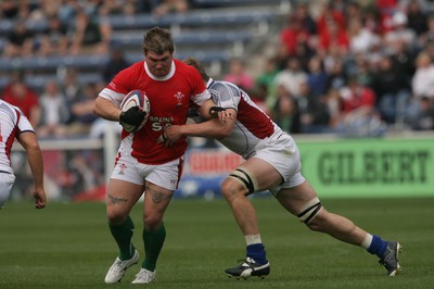 06.06.09 USA v Wales... Wales'  Richard Hibbard is tackled by USA's Louis Stanfill. 