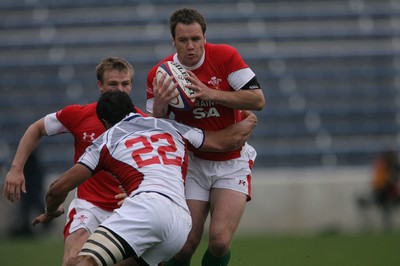 06.06.09 USA v Wales... Wales'  Mark Jones takes on USA's Junior Sifa.. 