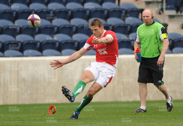 06.06.09 - USA Eagles v Wales - Wales' Dan Biggar kicks at goal as Neil Jenkins looks on. 