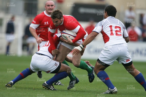 06.06.09 USA v Wales... Wales' Nicky Robinson takes on USA's Ata Maiifa. 
