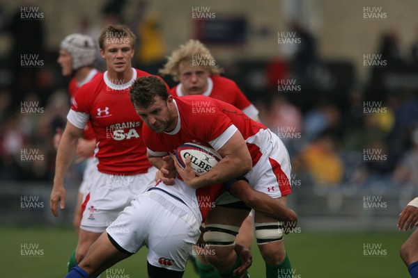 06.06.09 USA v Wales... Wales'  Deiniol Jones powers through. 