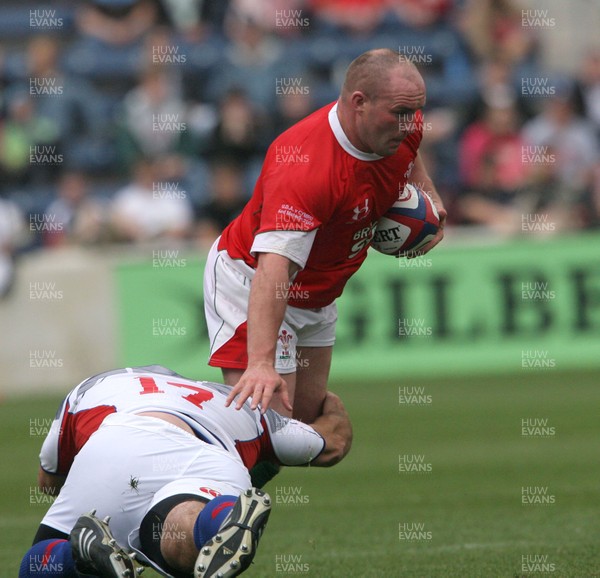 06.06.09 USA v Wales... Wales'  Gareth Williams is tackled by USA's Mike MacDonald. 