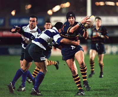 170398 - UWIC v Toulouse - The Times Student Rugby European Championships -  Gwion Bowen of UWIC takes on Stephane Longo