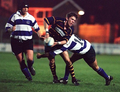 170398 - UWIC v Toulouse - The Times Student Rugby European Championships -  John Williams of UWIC is tackled by Xavier Garbajosa