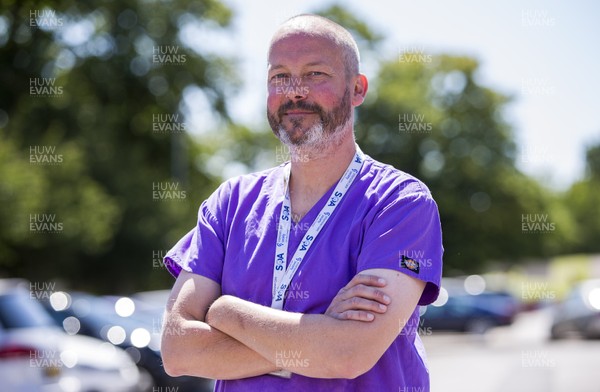 220720 - Picture shows Doctor David Hepburn as Vaughan Gething visits the Royal Gwent Hospital in Newport about how the staff coped during the peak of the coronavirus outbreak