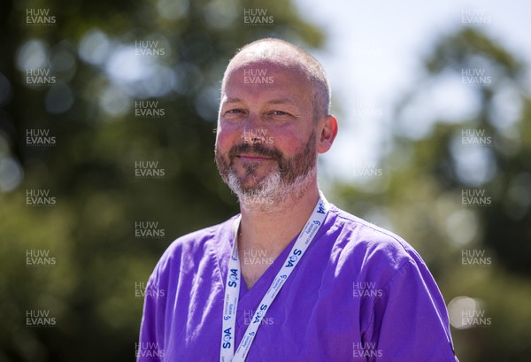 220720 - Picture shows Doctor David Hepburn as Vaughan Gething visits the Royal Gwent Hospital in Newport about how the staff coped during the peak of the coronavirus outbreak