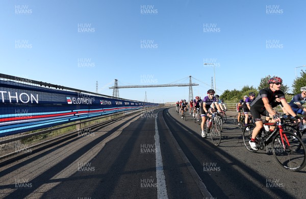 080718 - Velothon Wales - Riders go past Transporter Bridge in Newport