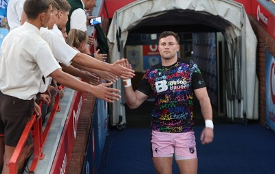 200326 - Vodacom Bulls v Cardiff Rugby - United Rugby Championship - Mason Grady of Cardiff greets fans