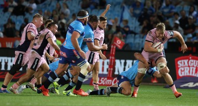 200326 - Vodacom Bulls v Cardiff Rugby - United Rugby Championship - Dan Thomas of Cardiff is tackled by Johan Grobbelaar of Vodacom Bulls