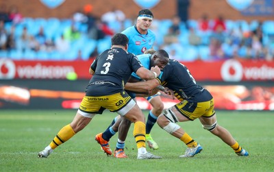 170525 - Vodacom Bulls v Dragons RFC - United Rugby Championship - Chris Coleman of the Dragons and Ben Carter (c) of the Dragons in to tackle Nama Xaba of the Vodacom Blue Bulls