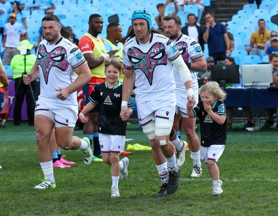 270424 - Vodacom Bulls v Ospreys - United Rugby Championship - Ospreys captain Justin Tipuric enters the field with mascots