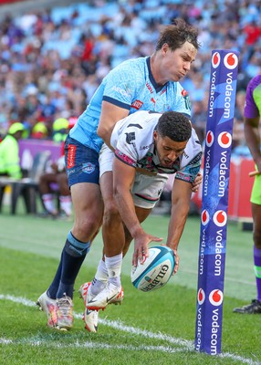 270424 - Vodacom Bulls v Ospreys - United Rugby Championship - Keelan Giles of Ospreys scores a try despite the tackle of Chris Smith of the Vodacom Blue Bulls