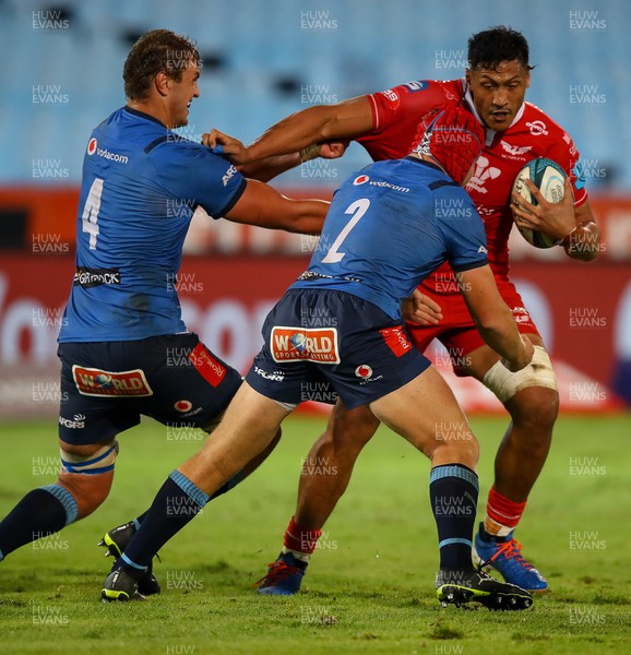 180322 - Vodacom Bulls v Scarlets - United Rugby Championship - Jac Price of the Scarlets tackled by Johan Grobbelaar of the Vodacom Bulls