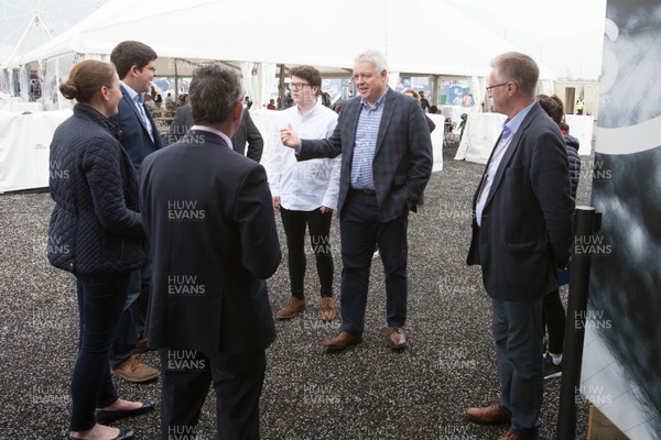 270518 - Volvo Ocean Race, Cardiff Bay -  First Minister Carwyn Jones arrives at the race stopover area with Huw Thomas, Leader of Cardiff City Council