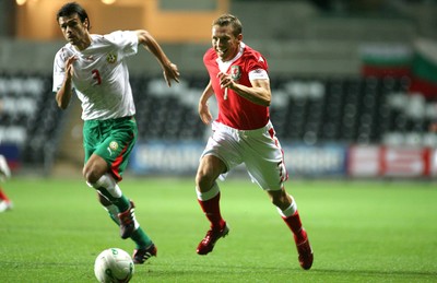 150806Wales v Bulgaria International Friendly, The Liberty Stadium, Swansea -  Wales' Craig Bellamy breaks past Rosen Kirilov 