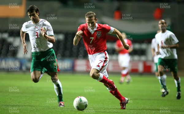 150806Wales v Bulgaria International Friendly, The Liberty Stadium, Swansea -  Wales' Craig Bellamy breaks past Rosen Kirilov 