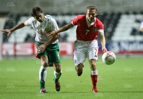 150806Wales v Bulgaria International Friendly, The Liberty Stadium, Swansea -  Wales' Craig Bellamy breaks away from Rosen Kirilov 