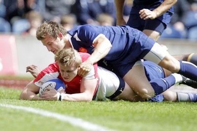 29.05.11Wales v France..IRB World Sevens Series Murrayfield... Wales' Jevon Groves (L) scores a try against France during an IRB World Series rugby sevens cup quarter-final match. 