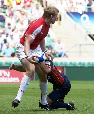 21.05.11 Wales v Spain, Twickenham Sevens ... Jevon Groves passes as he is tackled. 