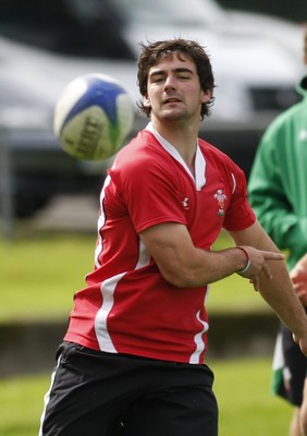 07.09.10 Wales 7's Commonwealth Training Squad -  Adam Hughes in action during squad training at RAF Halten. 