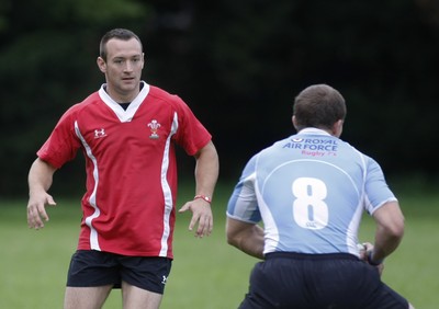 07.09.10 Wales 7's Commonwealth Training Squad -  Gareth Davies is put through defensive duties by the RAF 7's squad during squad training at RAF Halten. 