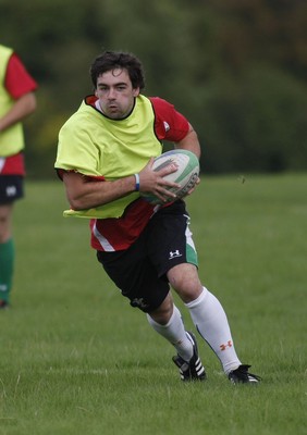 07.09.10 Wales 7's Commonwealth Training Squad -  Adam Hughes in action during squad training at RAF Halten. 