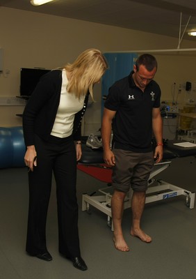 07.09.10 Wales 7's Commonwealth Training Squad - The Medical Rehabilitation unit: Hedly Hall -  Podiatrist Sharon Gray examines Gareth Davies during their visit to Hedley Hall. 