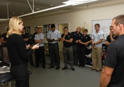 07.09.10 Wales 7's Commonwealth Training Squad - The Medical Rehabilitation unit: Hedly Hall -  Podiatrist Sharon Gray chats to members of Wales & RAF 7's squads. 