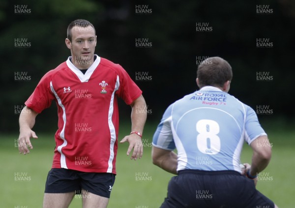 07.09.10 Wales 7's Commonwealth Training Squad -  Gareth Davies is put through defensive duties by the RAF 7's squad during squad training at RAF Halten. 