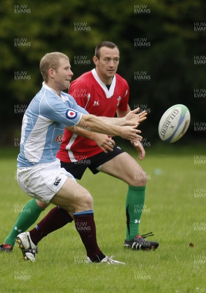 07.09.10 Wales 7's Commonwealth Training Squad -  Gareth Davies is put through defensive drills during squad training at RAF Halten. 
