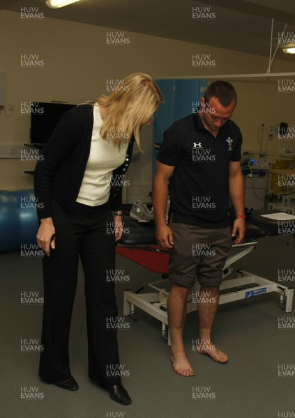 07.09.10 Wales 7's Commonwealth Training Squad - The Medical Rehabilitation unit: Hedly Hall -  Podiatrist Sharon Gray examines Gareth Davies during their visit to Hedley Hall. 