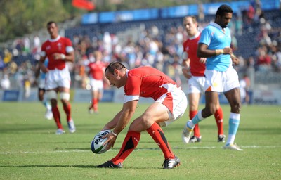 11.10.10 - Wales v India - Commonwealth Games Sevens Delhi 2010 -  Gareth Davies of Wales runs in to score try. 