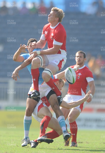 11.10.10 - Wales v India - Commonwealth Games Sevens Delhi 2010 -  Jevon Groves of Wales runs jumps for high ball. 
