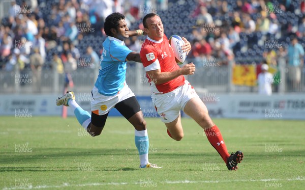 11.10.10 - Wales v India - Commonwealth Games Sevens Delhi 2010 -  Gareth Davies of Wales runs in to score try. 