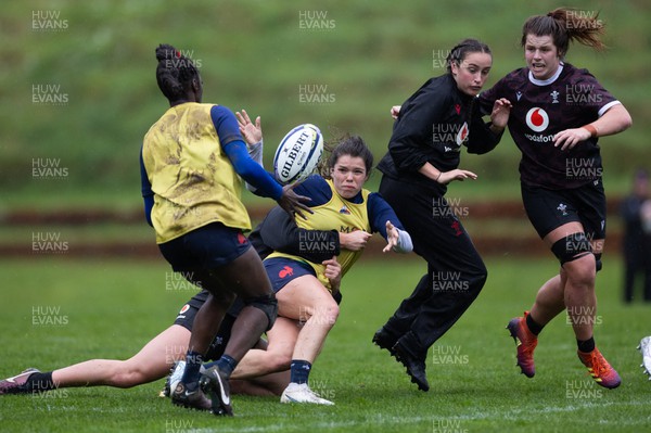 171023 - Wales Women and France Women combined training session - Carys Williams-Morris tackles during a combined training session at Rugby League Park in Wellington against France Women ahead of their first matches in WXV1