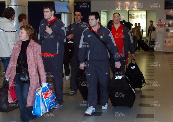 270206 Michael Owen and Stephen Jones arrive back in Cardiff after the international weekend in Dublin  