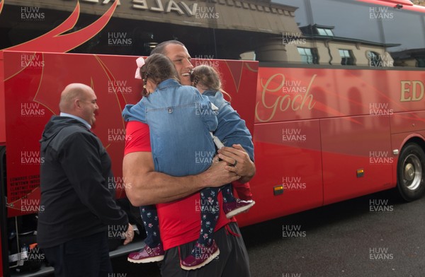 041119 - Aaron Shingler is reunited with his daughter as the Wales World Cup rugby squad arrive back at the Vale Hotel from Japan