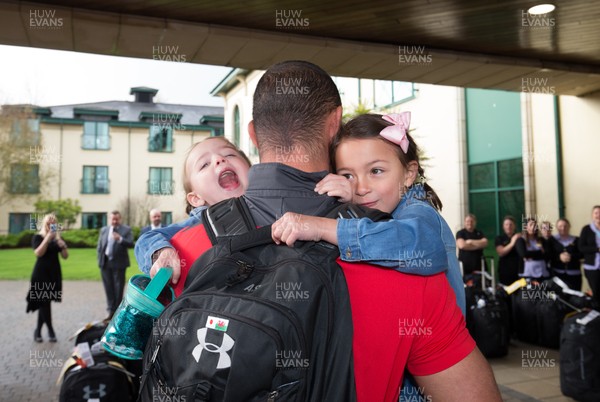 041119 - Aaron Shingler is reunited with his daughter as the Wales World Cup rugby squad arrive back at the Vale Hotel from Japan