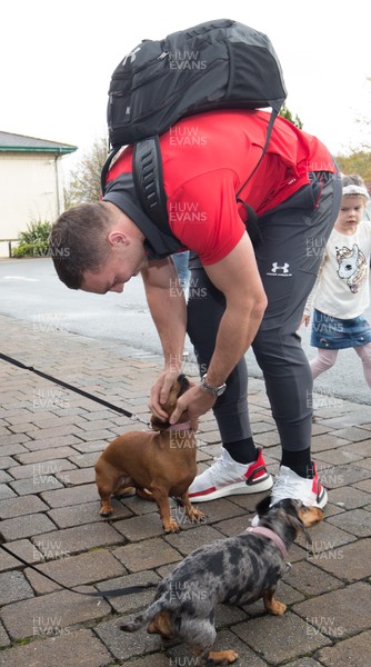 041119 - George North is met by by his canine fans as the Wales World Cup rugby squad arrive back at the Vale Hotel from Japan