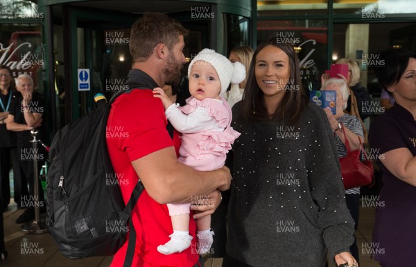 041119 - Leigh Halfpenny is reunited with his family as the Wales World Cup rugby squad arrive back at the Vale Hotel from Japan
