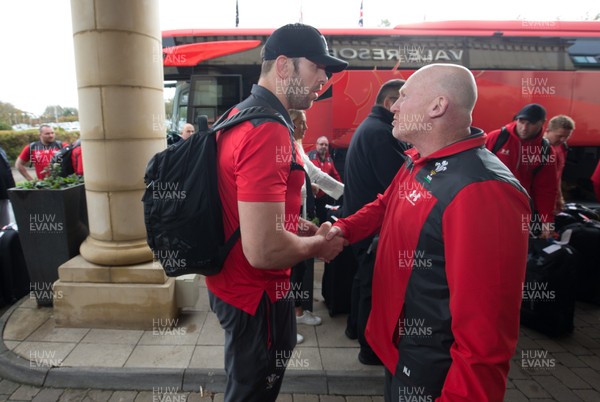 041119 - Alun Wyn Jones and Neil Jenkins shake hands as the Wales World Cup rugby squad arrive back at the Vale Hotel from Japan