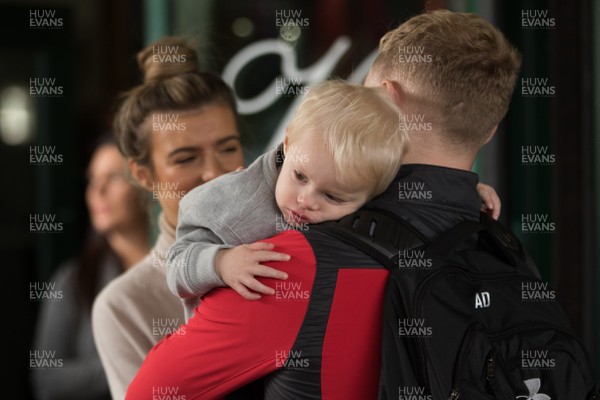 041119 - Aled Davies is reunited with his son as the Wales World Cup rugby squad arrive back at the Vale Hotel from Japan