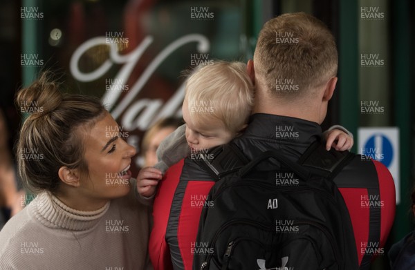 041119 - Aled Davies is reunited with his son as the Wales World Cup rugby squad arrive back at the Vale Hotel from Japan