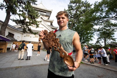 260625 - Wales Rugby arrive in Kitakyushu - Macs Page with the love spoon
