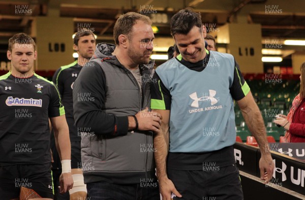 130315 - Wales Captains Run - Scott Quinnell talks to Mike Phillips during training